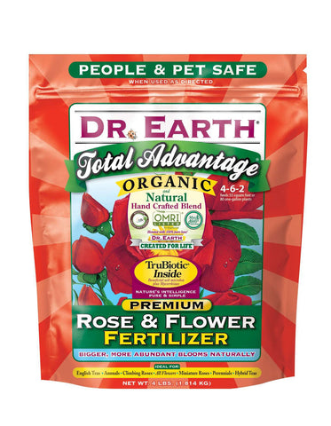 Dr. Earth Total Advantage Rose and Flower Fertilizer bottle with nutrient-rich blend for vibrant blooms.