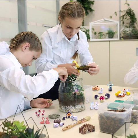 Dracarys miniature figurines enhance garden dioramas with playful details.