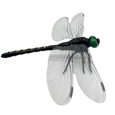 Dragonfly Clip Black worn on a backpack during hiking