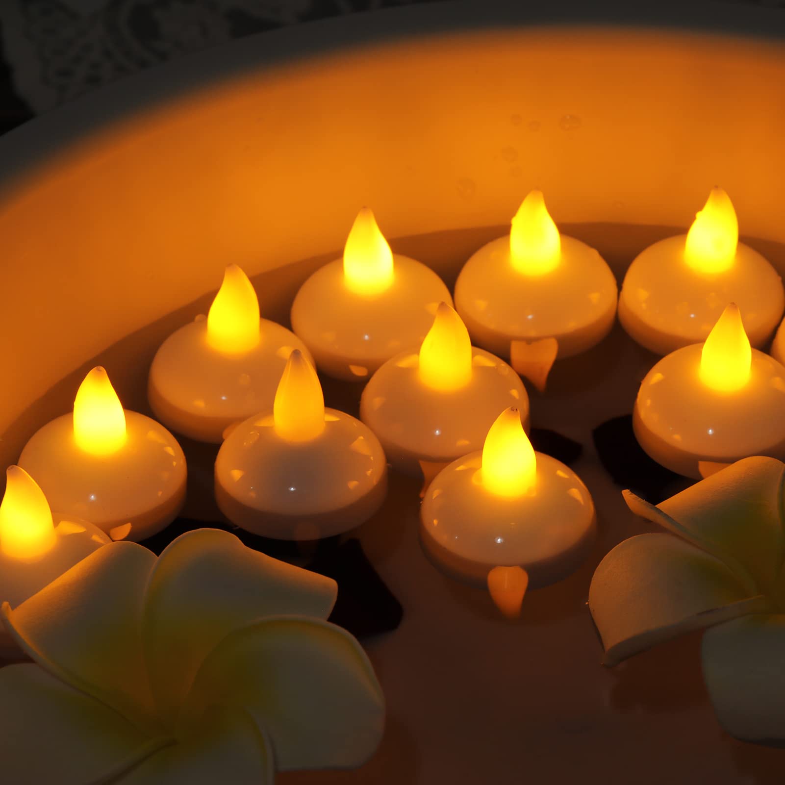 DragonflyDreams pool decoration tealights reflect light on water during parties