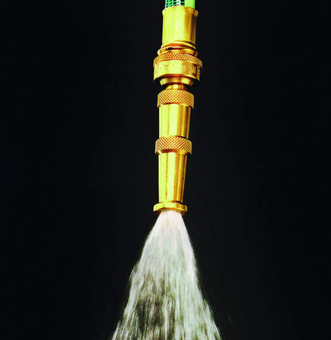Dramm 12380 brass nozzle displaying fan spray for broad surface coverage.