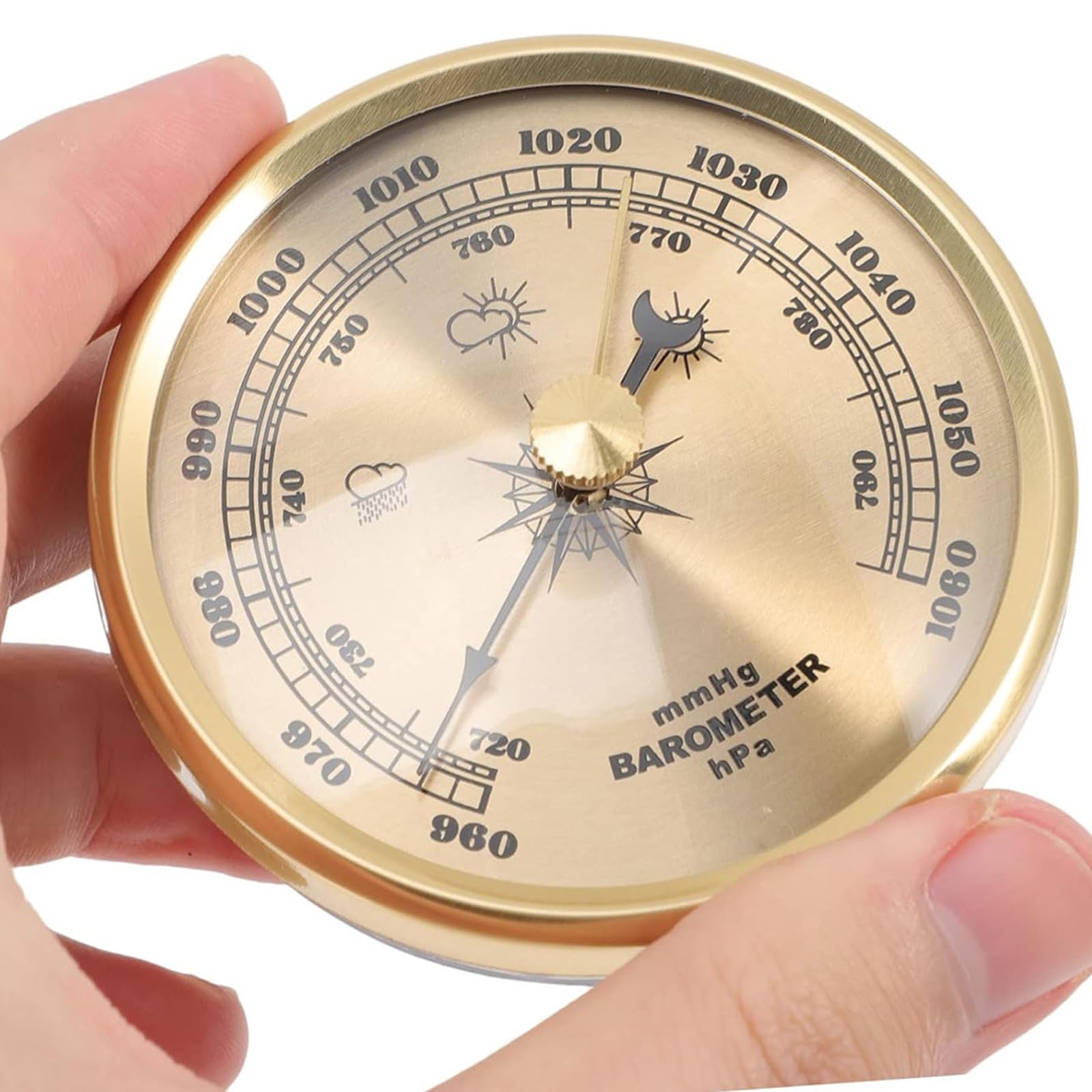Dranvosk gold barometer in hand shows portable, pocket-friendly design.