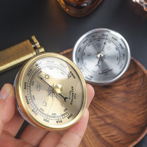 Dranvosk gold barometer weather indicator displays trends for planning outdoor activities.