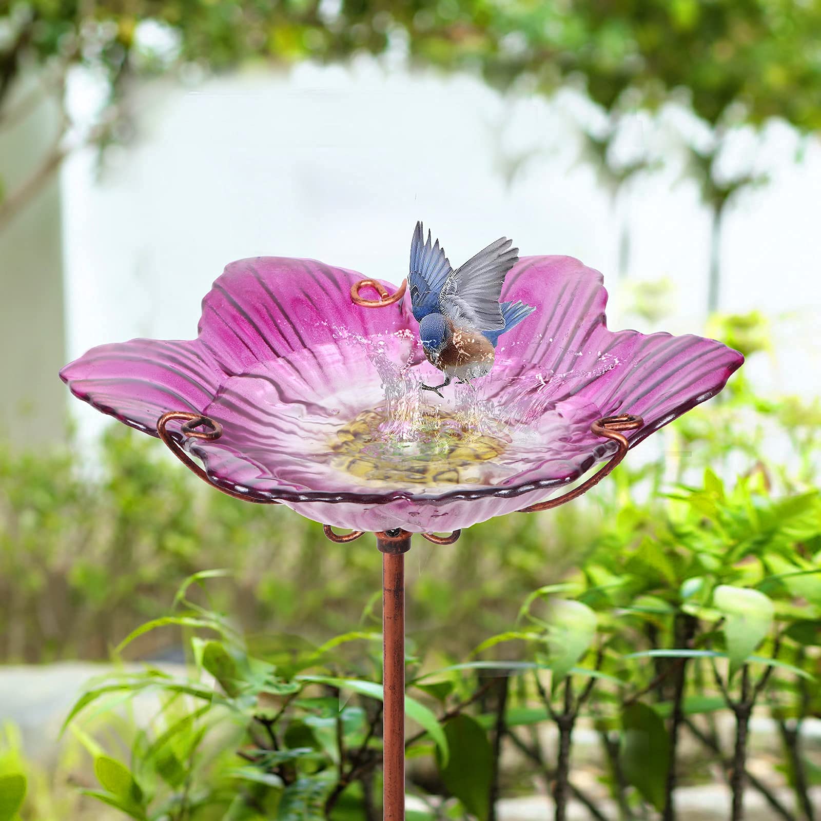 Dream Garden four-pronged metal stake ensures stable placement in outdoor spaces.