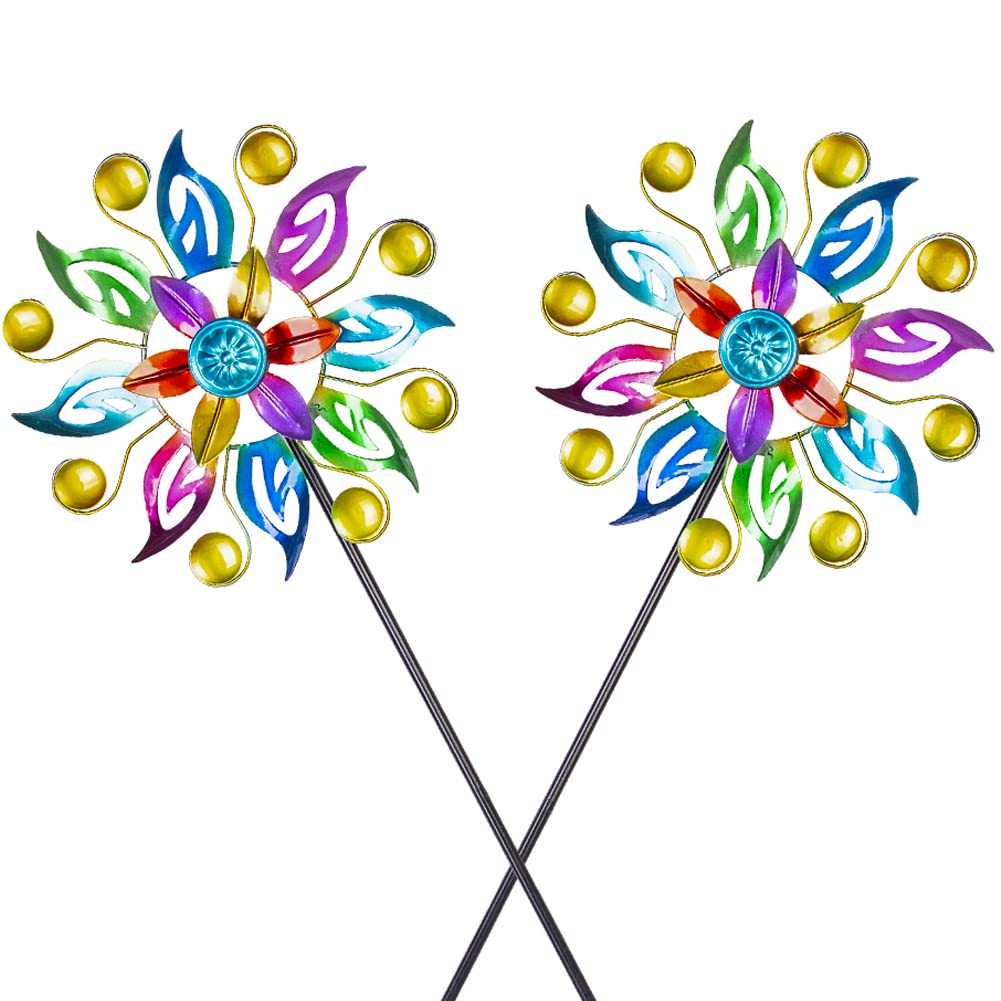 Dreamysoul wind spinner with colorful blades embellishing a sunny garden.