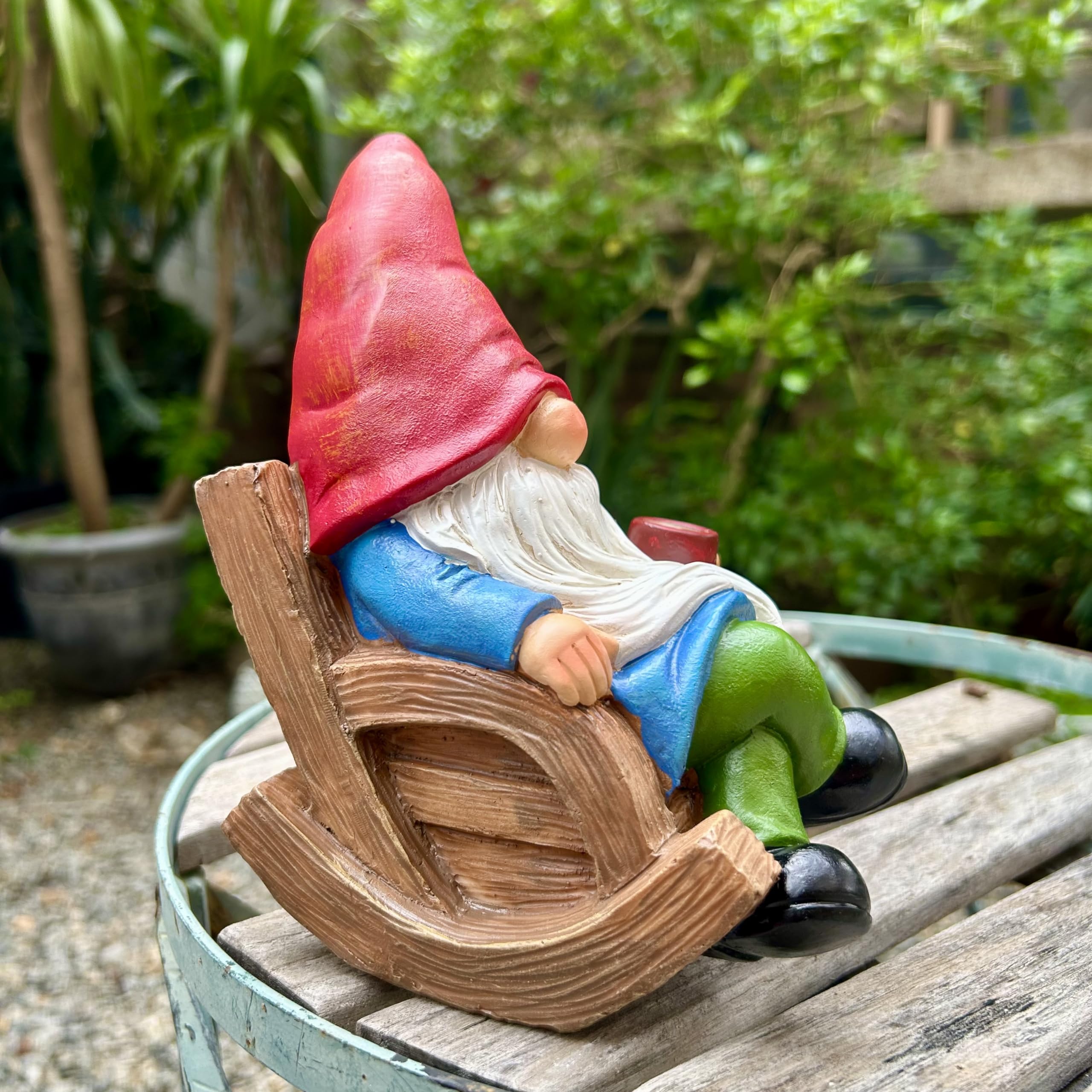 Drinking Coffee Gnome statue in yard creates a garden focal point.