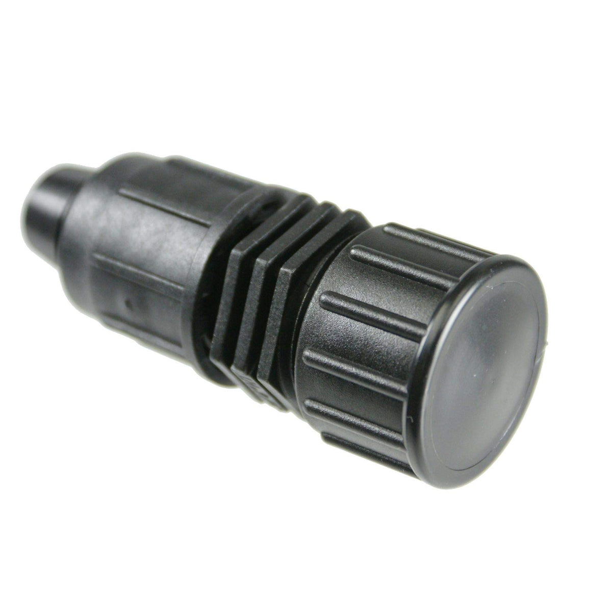 Drip Depot Perma-Loc end cap on 1/2-inch tubing closes irrigation runs securely.