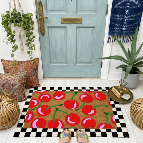 Drydiet cherry coir doormat top view with vibrant summer cherries inviting guests to entry