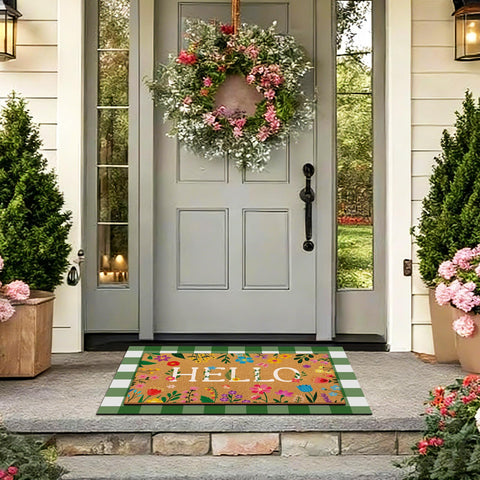 Drydiet floral hello coir doormat paired with plaid rug for front door entryway.