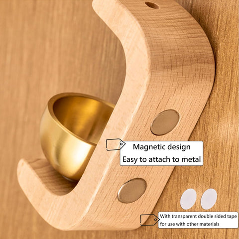 Closeup of beech wood and brass detailing on the DsoneJagr chime bell