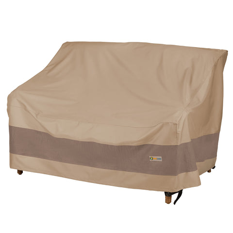 Duck Covers Elegant waterproof loveseat cover protects a 52-inch outdoor sofa from rain and debris.