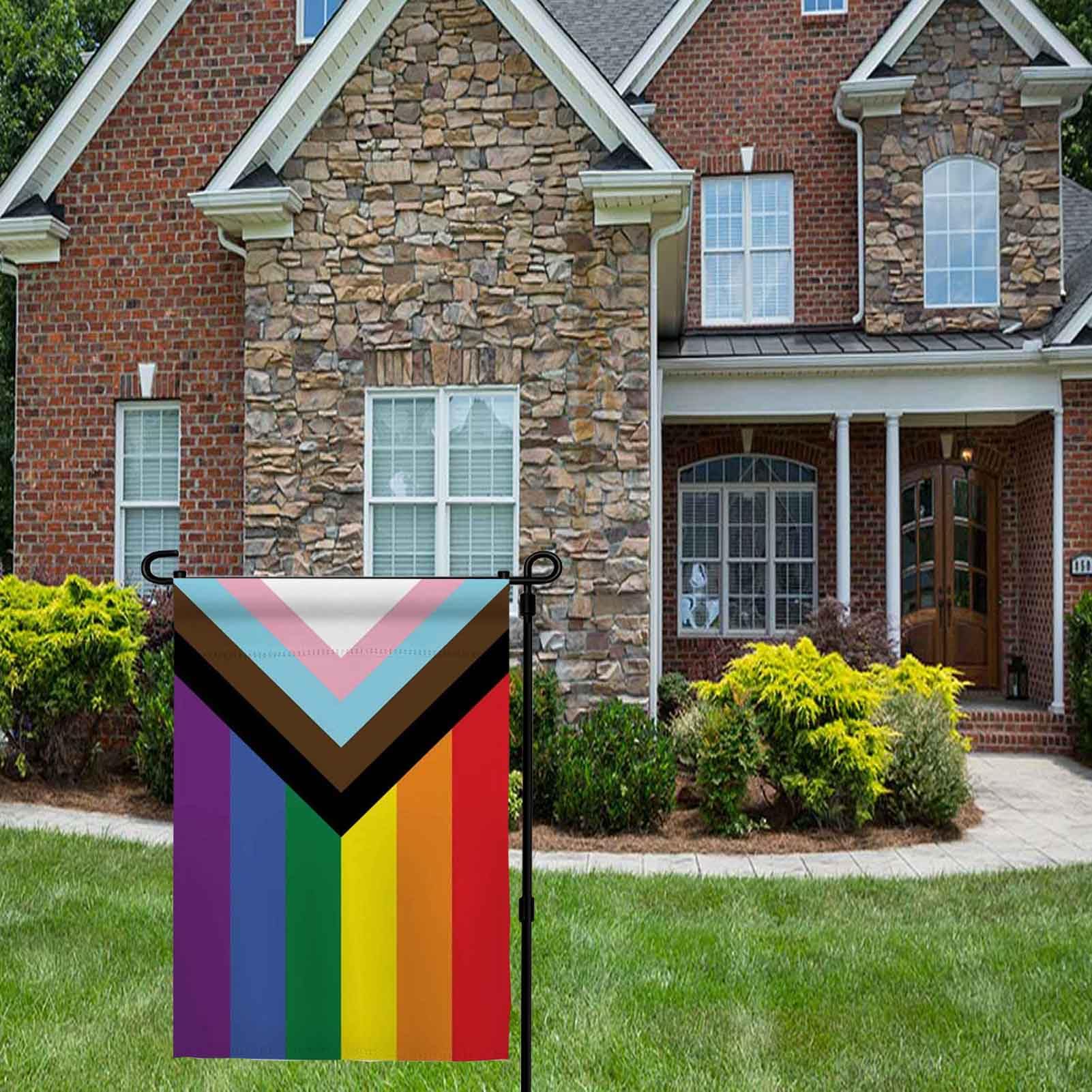 Ducuh garden flag displayed on lawn adds welcoming vibe.