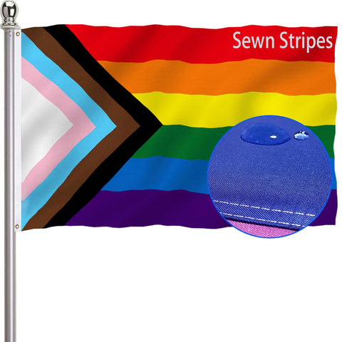 Ducuh progress pride flag in outdoor setup showing durable sewn construction