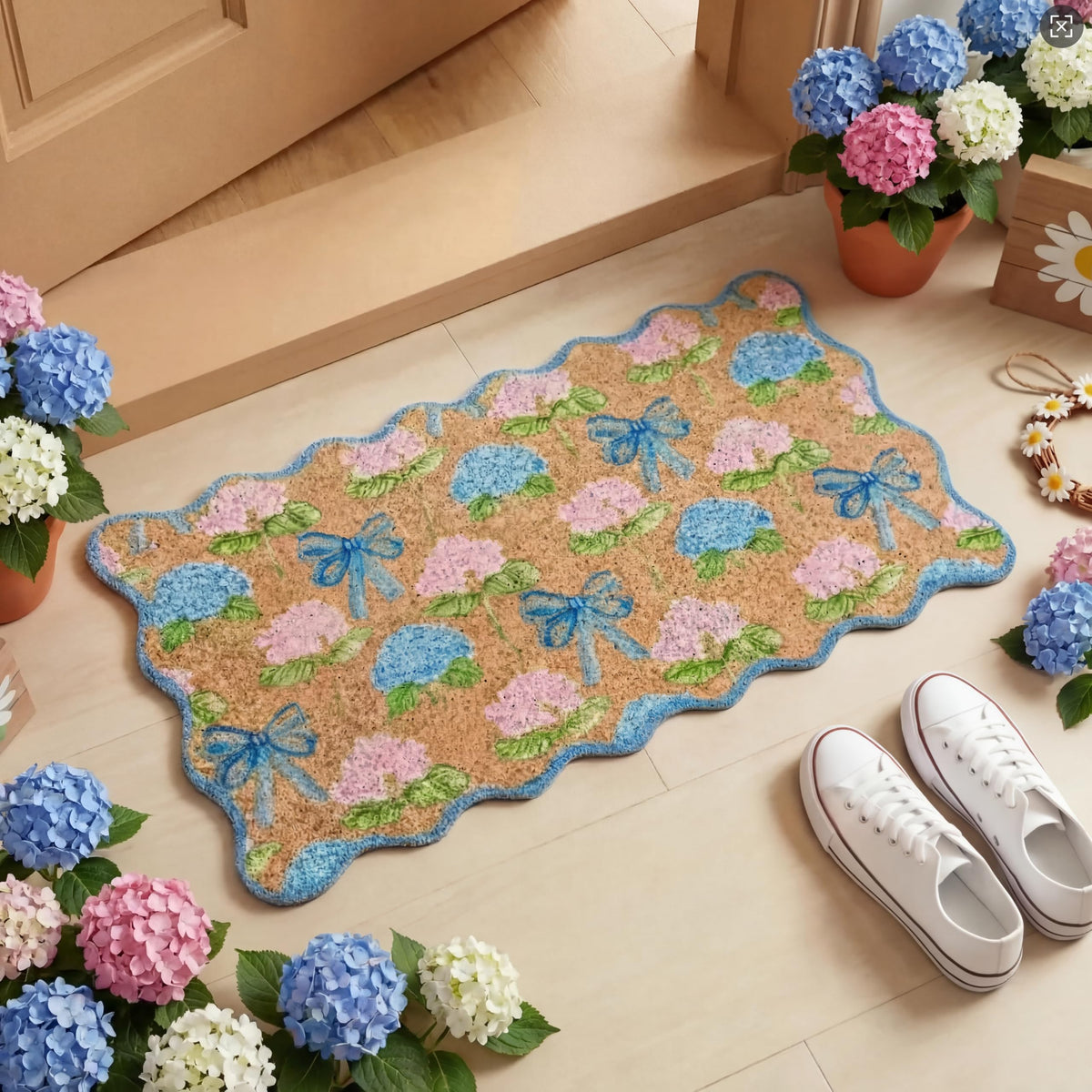 Dunzy hydrangea doormat with blue scalloped pattern welcomes guests while catching dirt.