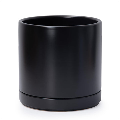 D'vine Dev 10-inch black ceramic planter pot, front view, showcasing a sleek cylindrical design.