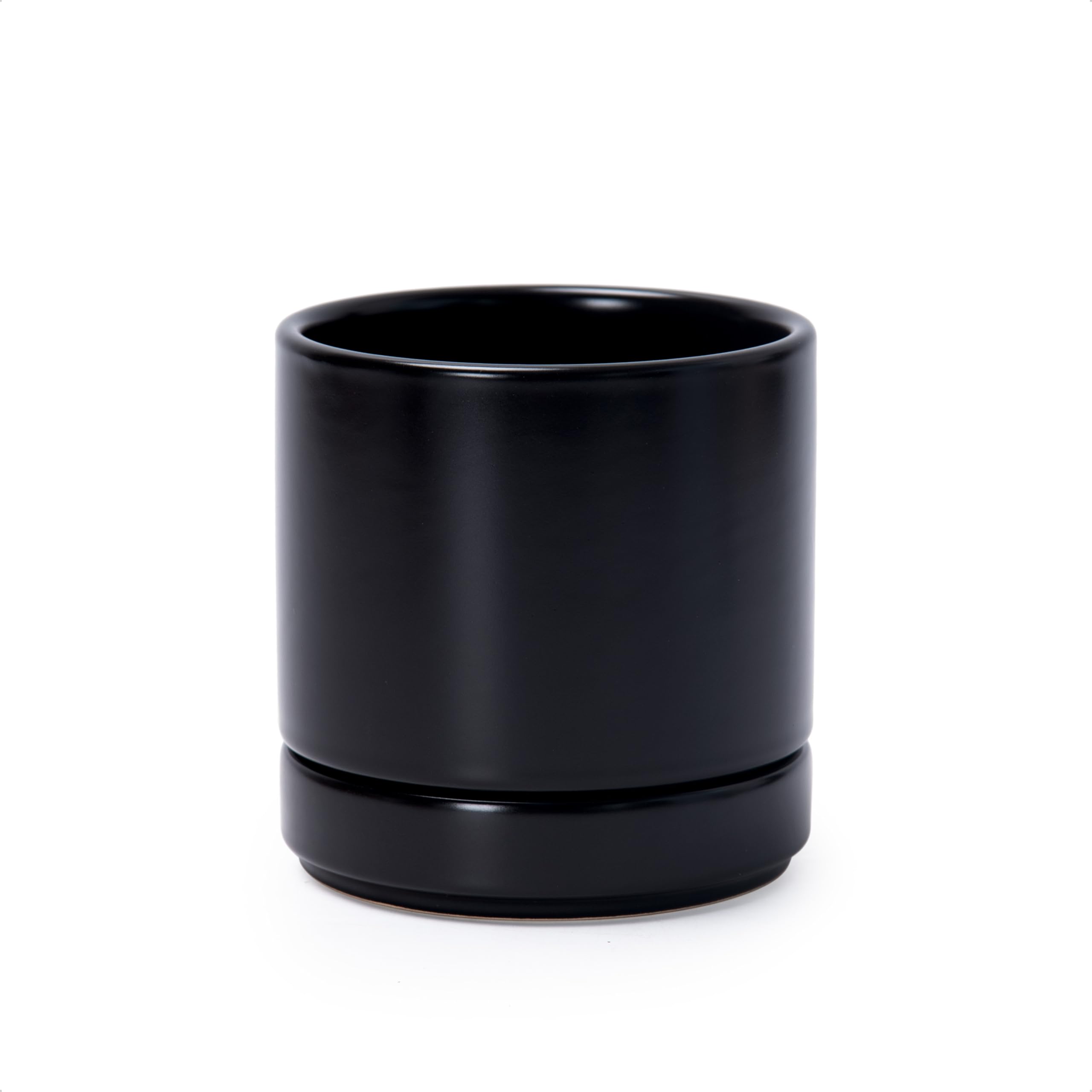 Dvine Dev 4.7-inch ceramic planter with drainage hole for healthy soil drainage.