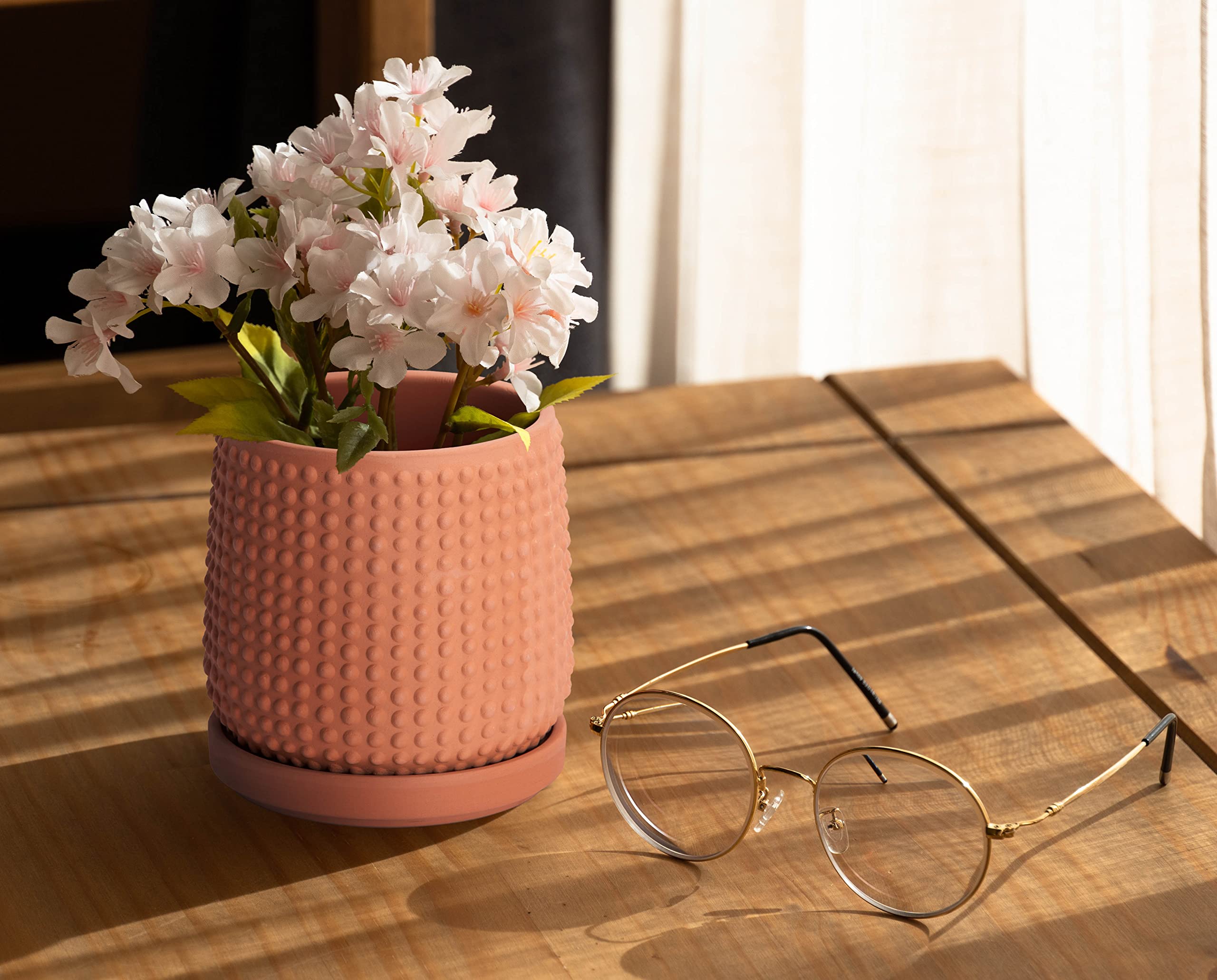 D'vine Dev handcrafted terracotta texture adds artisanal charm to interiors.