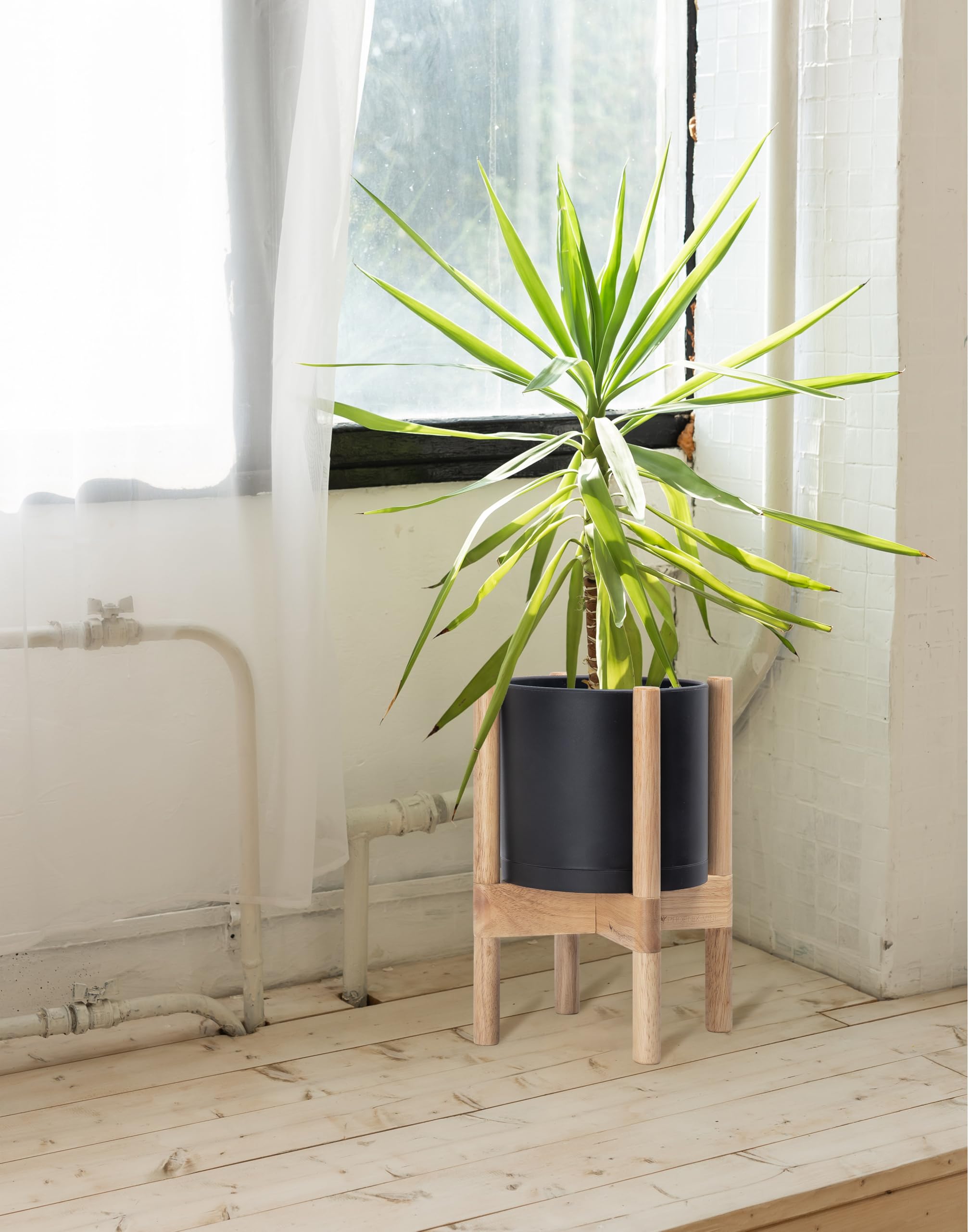 D'vine Dev cylinder-shaped 8-inch pot with matte finish for real or faux plants.