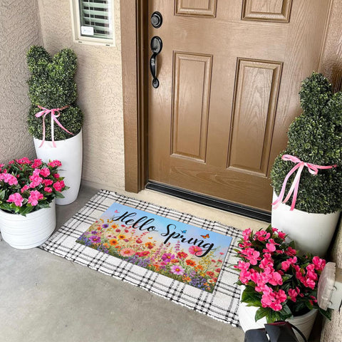 Dynamara Hello Spring doormat is waterproof and easy to clean for busy homes.