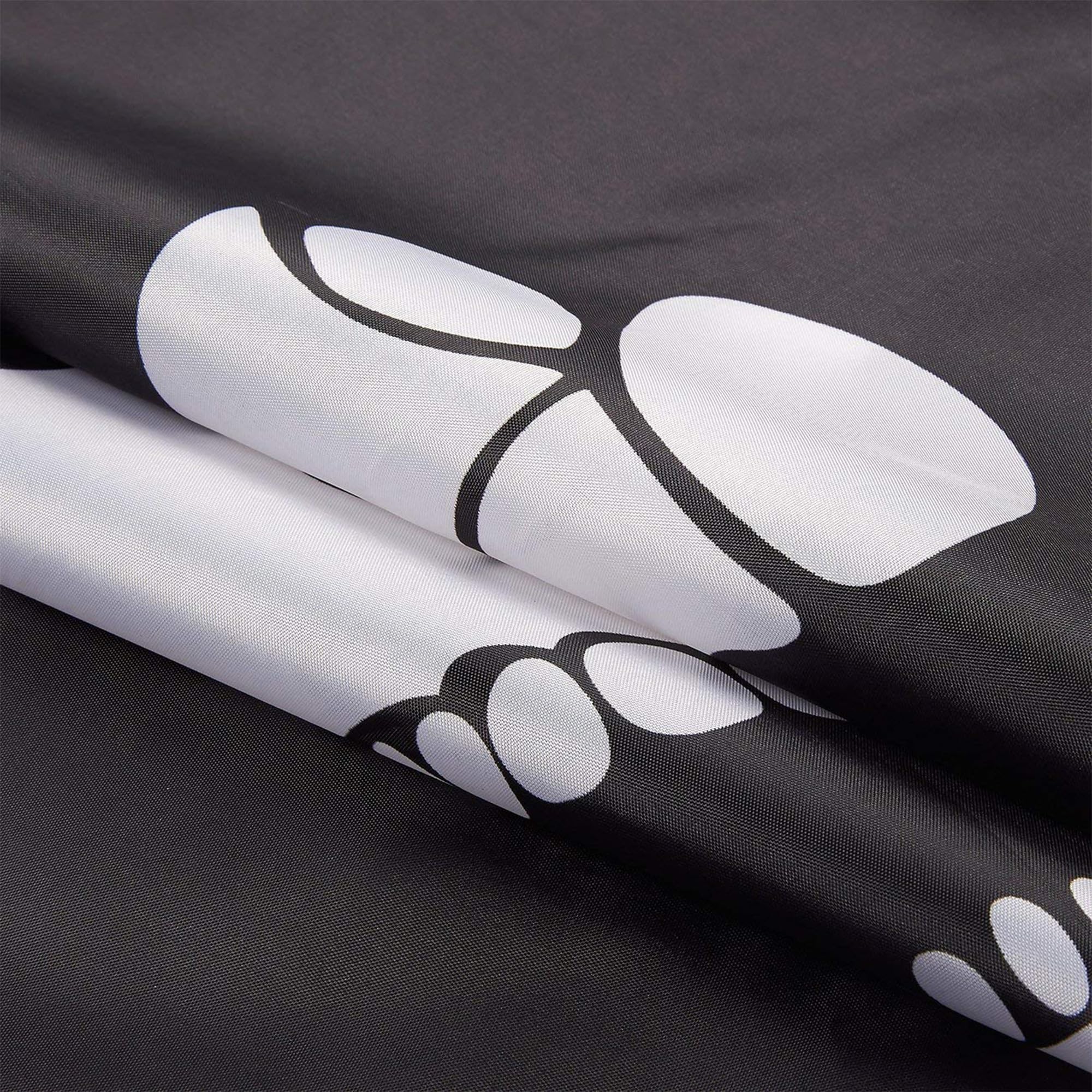 Dyung Tec pirate flag featuring double stitching and canvas header for durability.