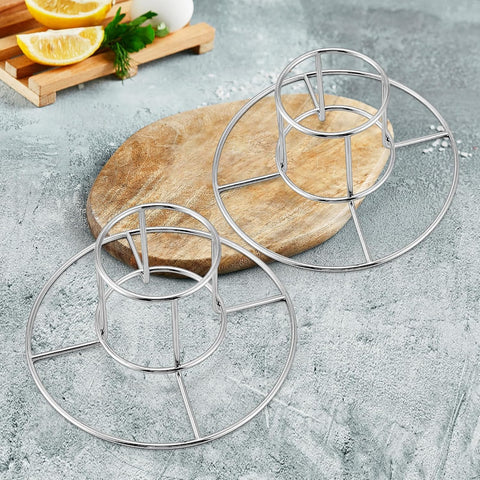 E-far holder shown on grill for outdoor cooking convenience