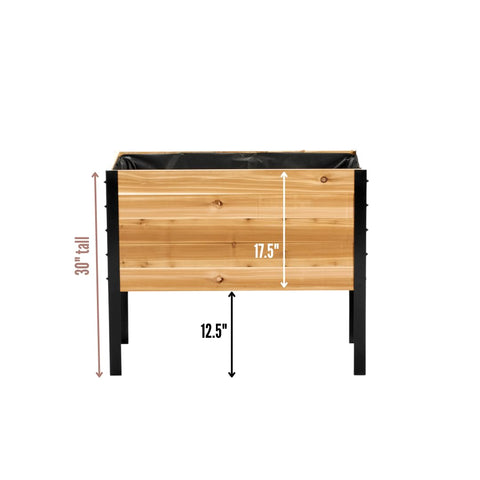 EARTH ELEVATED cedar bed built-in drainage enables low-maintenance watering for herbs and vegetables.