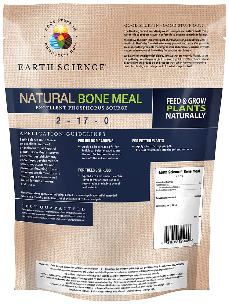 Applying Earth Science Bone Meal into soil to support early growth and root establishment.