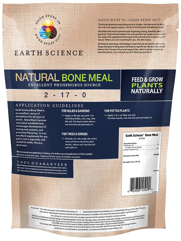 Applying Earth Science Bone Meal into soil to support early growth and root establishment.