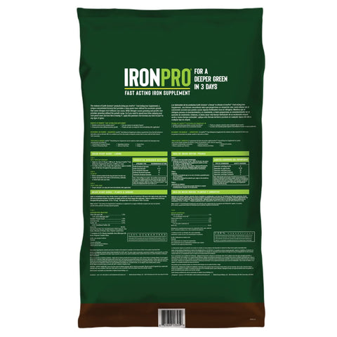 Earth Science IronPro being applied to a lush lawn for deeper green color.