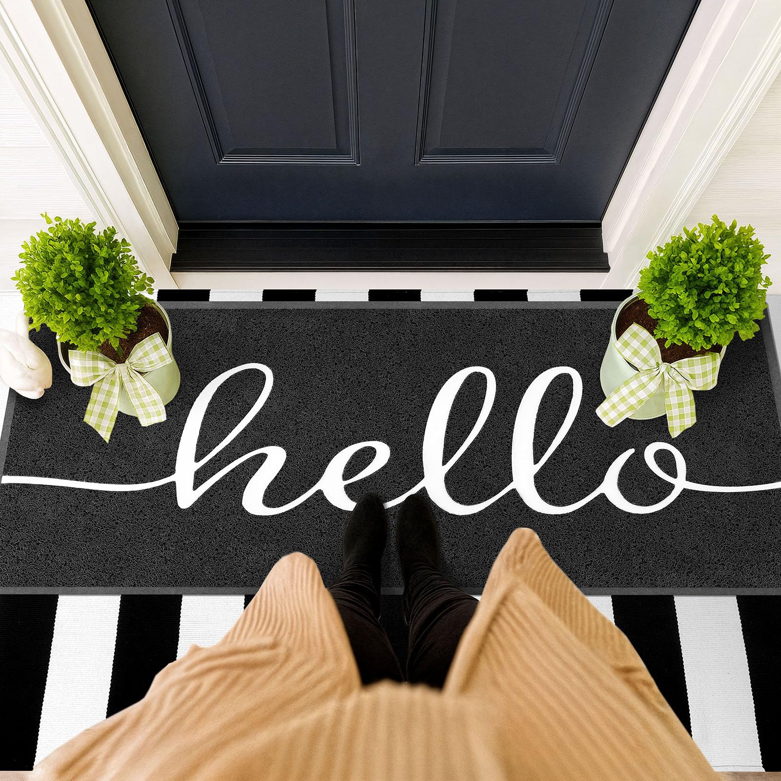 EARTHALL heavy-duty mat with non-slip rubber backing stays in place.