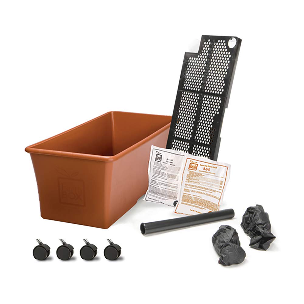 EarthBox mulch covers in black and white for moisture management and seasonal aesthetics.