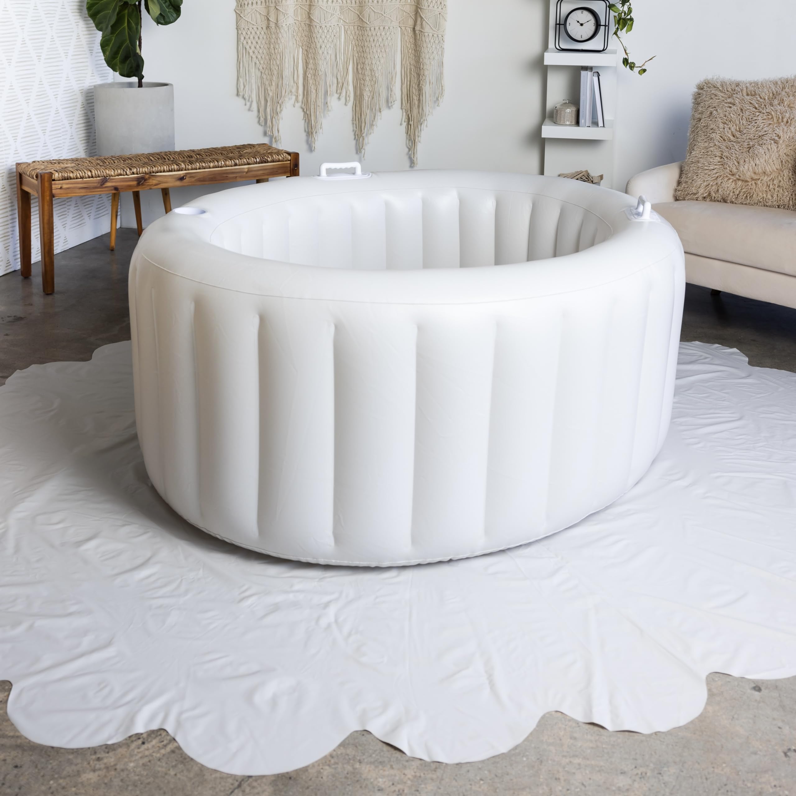 Earthside floor covering marshmallow protects floors under the birthing pool.
