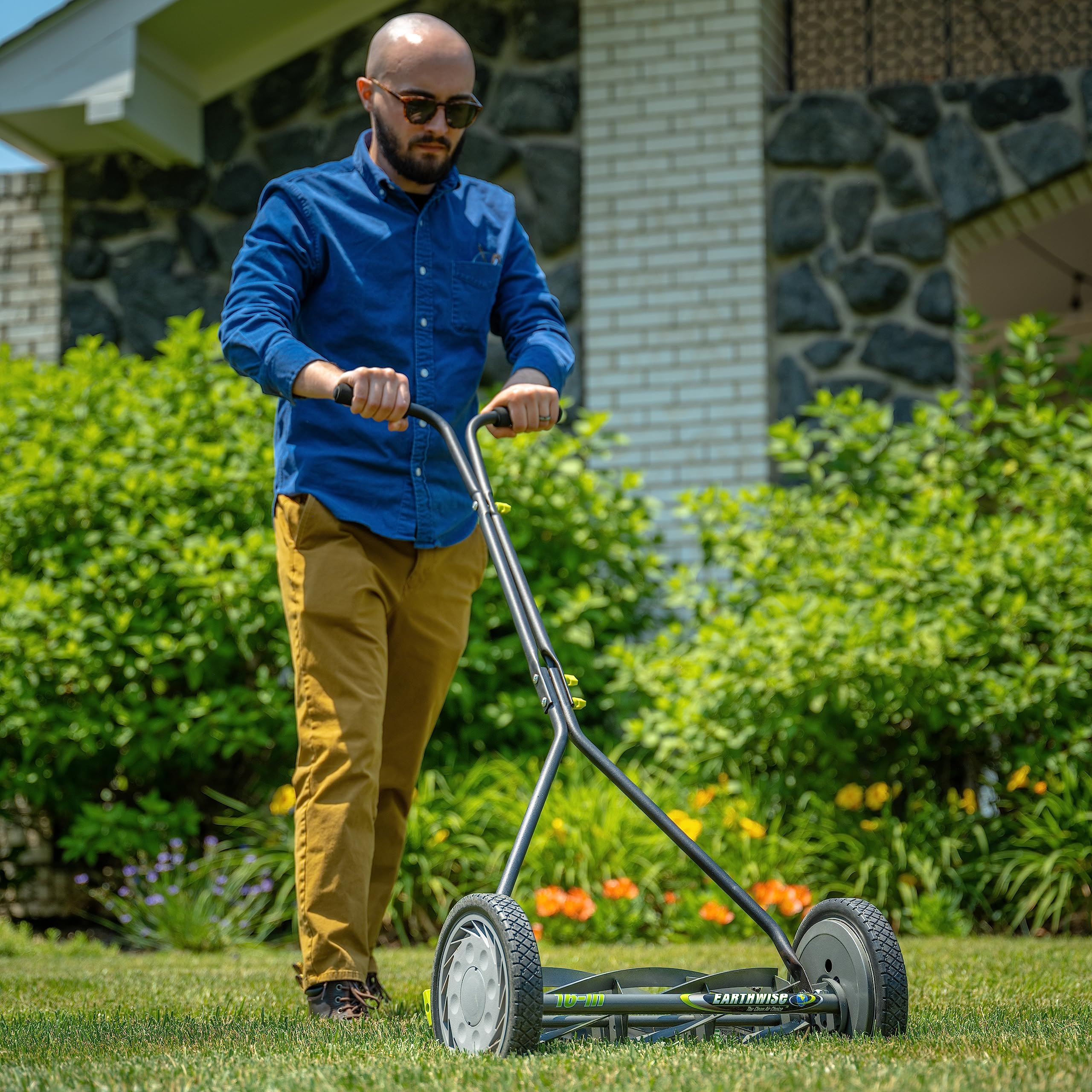 Earthwise 1715-16EW 10-inch wheels for smooth, stable pushing across turf.