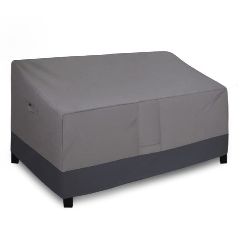 Easy-Going outdoor couch cover on a patio sofa protects from sun and dust.