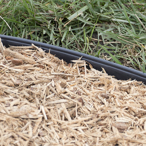EasyFlex edge around trees and plants ensures tidy, protected borders.