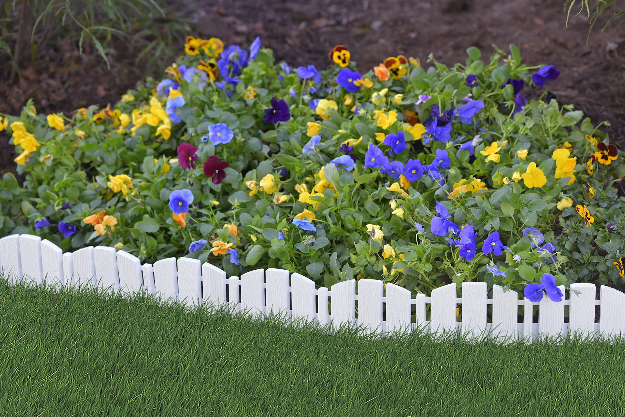 EasyFlex No-Dig edging spikes installed for secure ground anchoring.