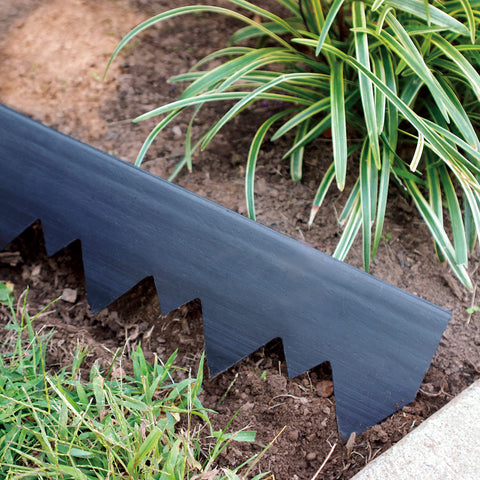 EasyFlex straight-top edging installed in soil for a precise straight line.