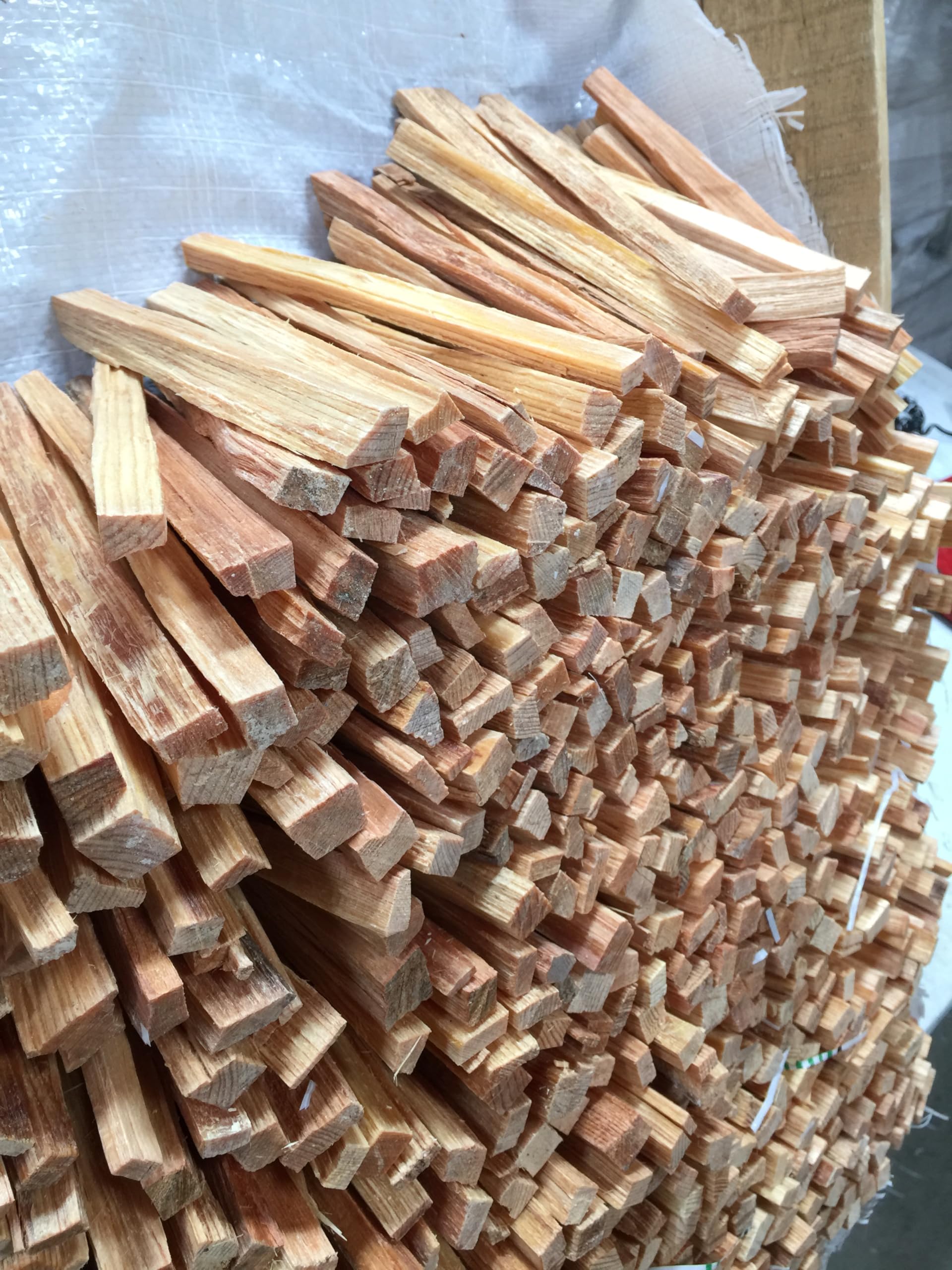 Eco-Stix setup for criss-cross fire-starting technique with efficient wood ignition.