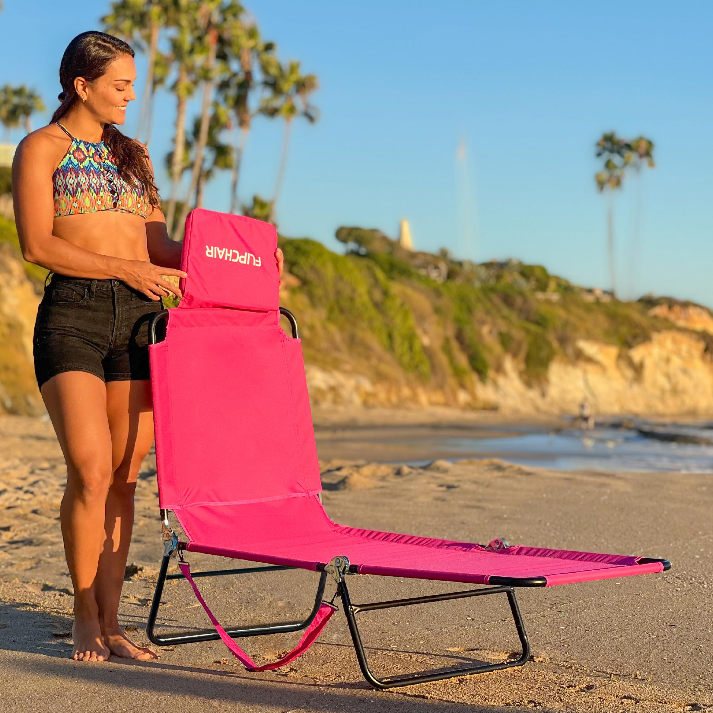 EasyGo Products pink lawn chair with reclined backrest.