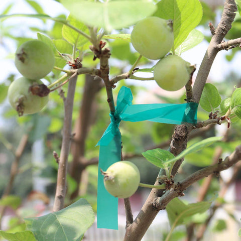 Bright green visibility helps gardeners locate ties at a glance.