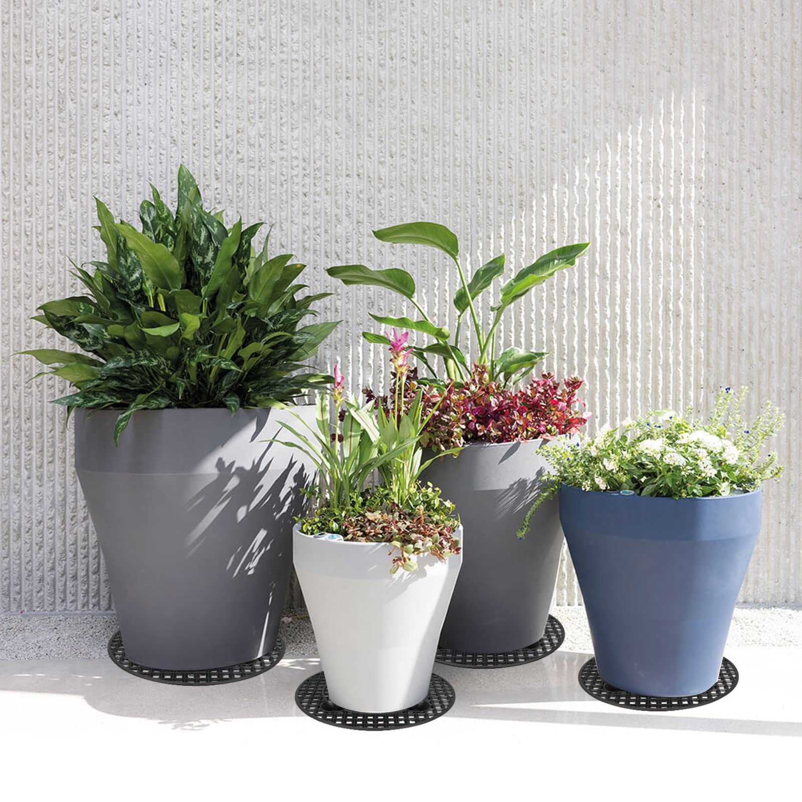 EATHEATY 12-pack plant riser set keeps heavy pots off the floor and organized.