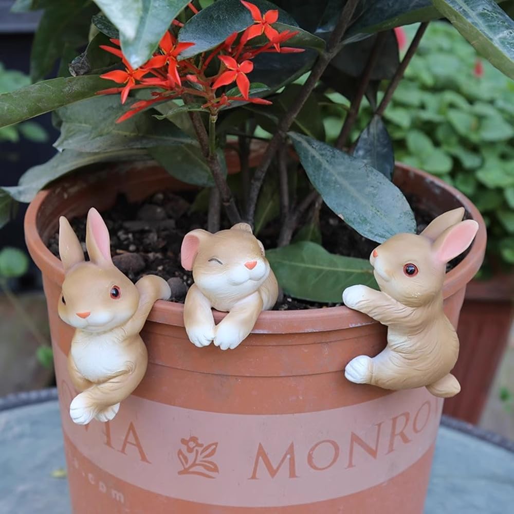Ebrima bunny figurine plant pot hanger decorates fences with playful detail.