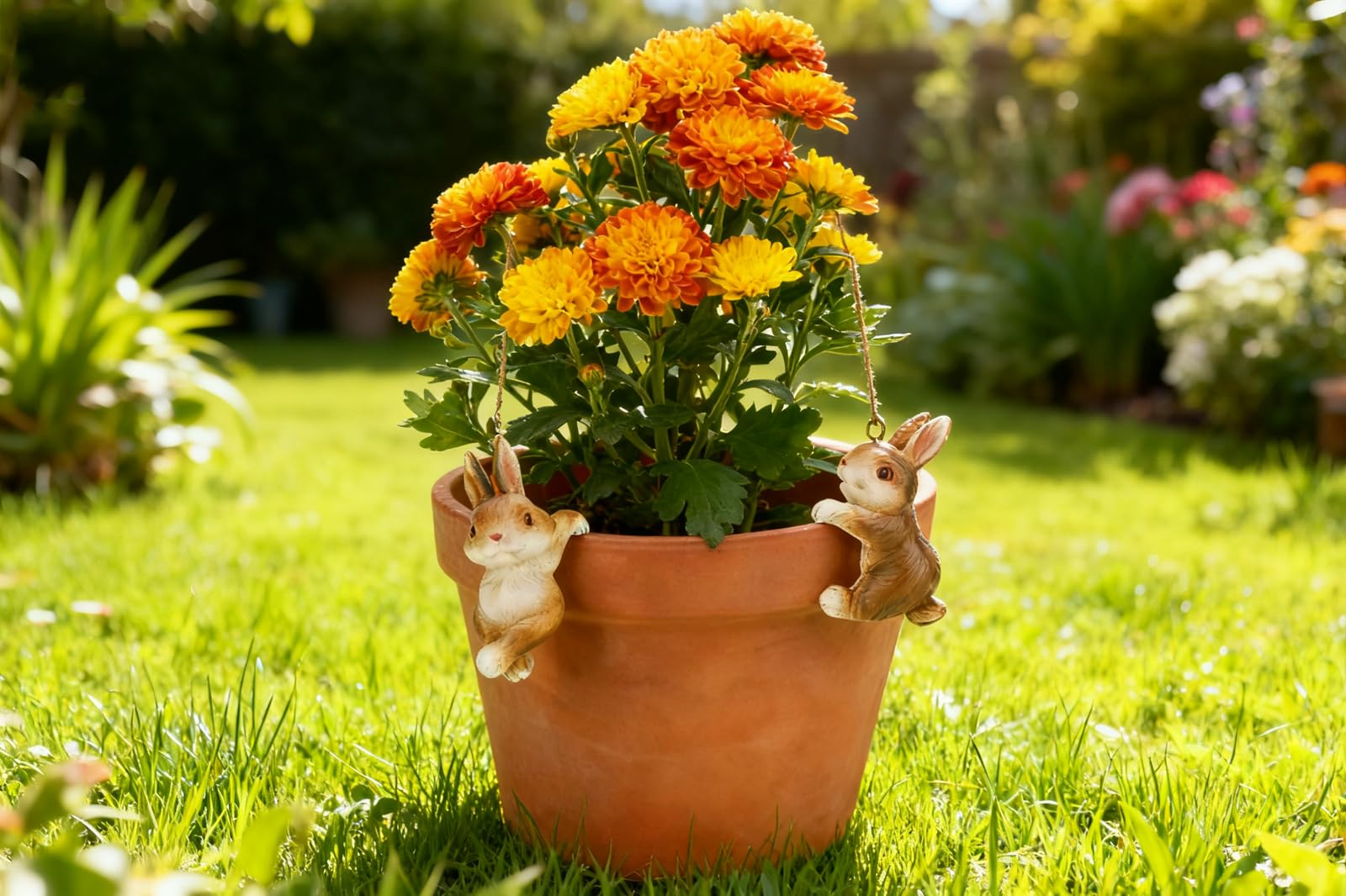 Ebrima bunny figurine plant pot hanger features three distinct poses for variety.