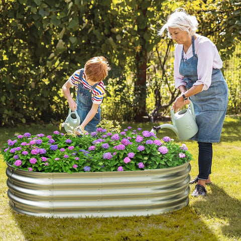 Eclaron oval planter on patio use with herbs thriving.