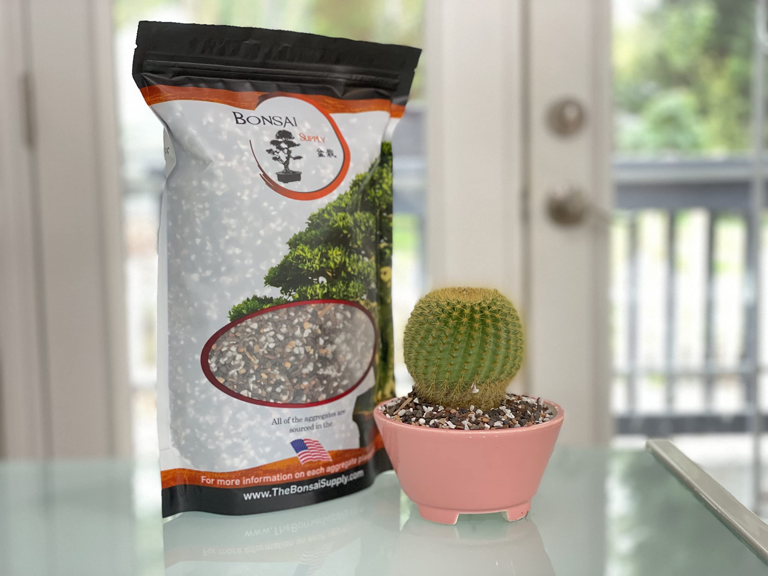 Eco-friendly sealed packaging of bonsai soil emphasizing sustainability.