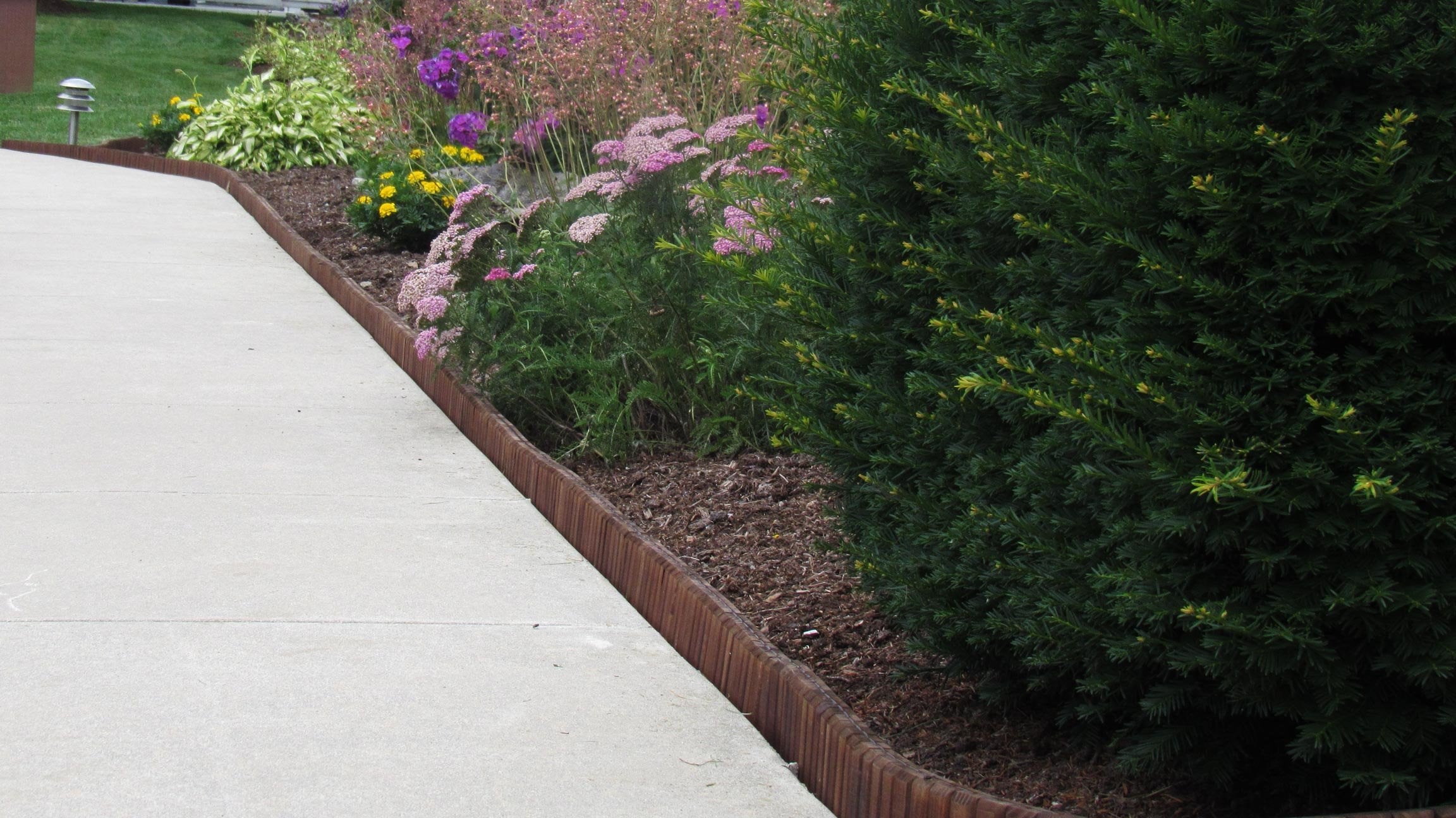 Eco-Green edging piece is 30 inches long for long, continuous landscape lines.