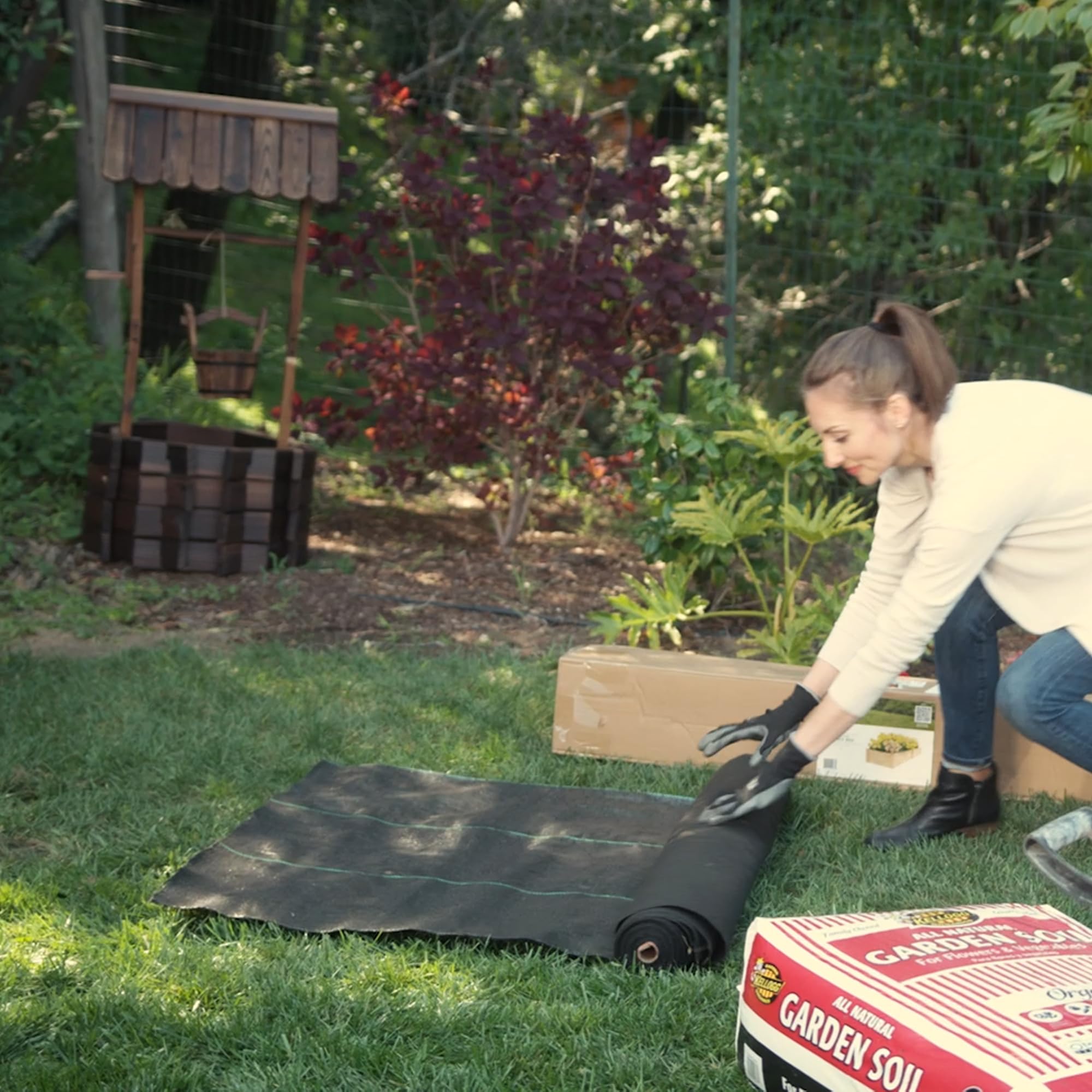 ECOgardener heavy-duty weed control mat protecting garden beds long-term.