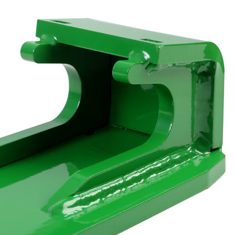 ECOTRIC green brackets installed on a loader frame for professional-grade equipment.
