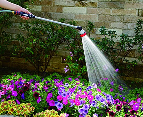 Close-up of Eden wand thumb control for smooth water flow and on/off.