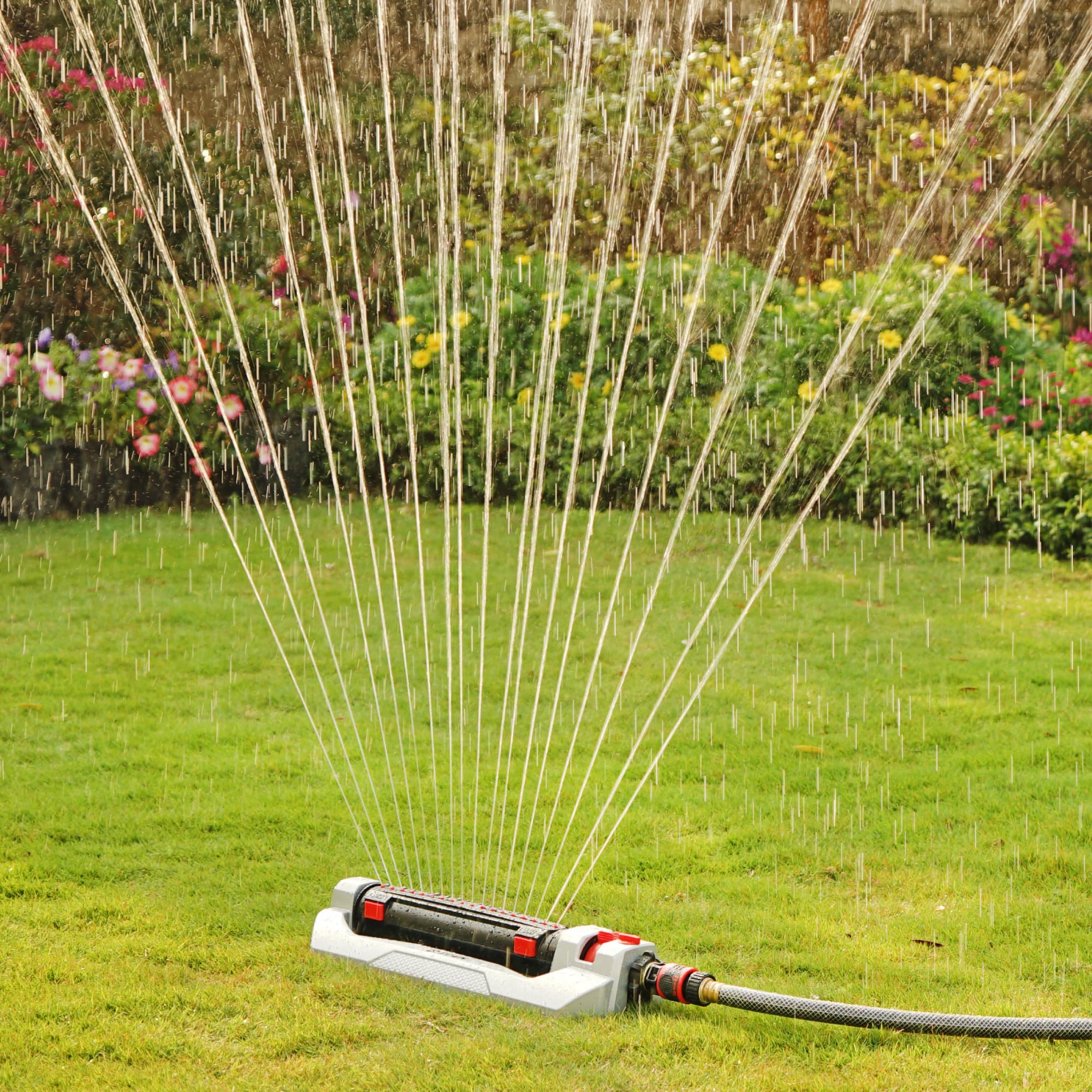 Eden Turbo Oscillating Sprinkler range control slider enables customizable reach.